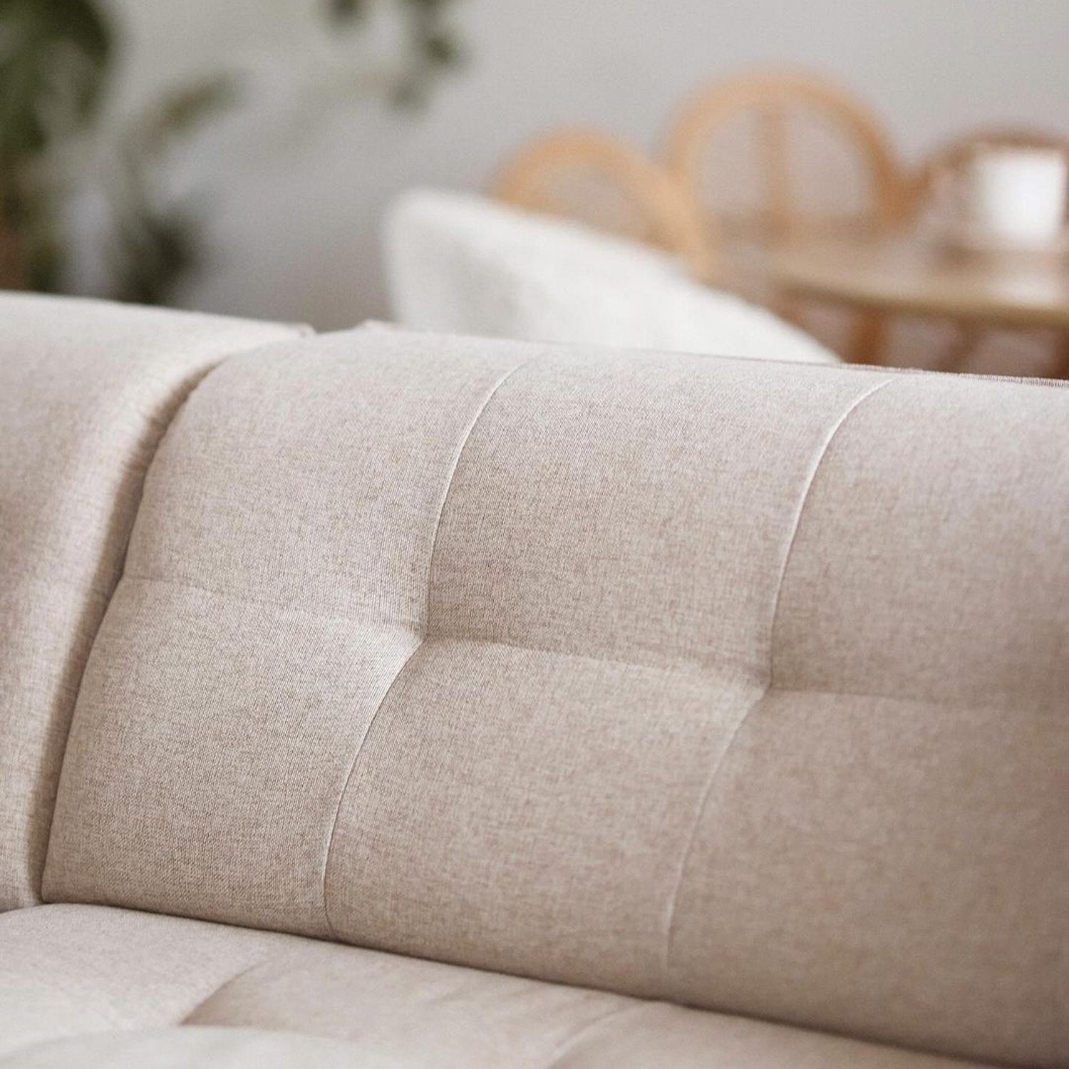 Neutral toned sofa with textured upholstery