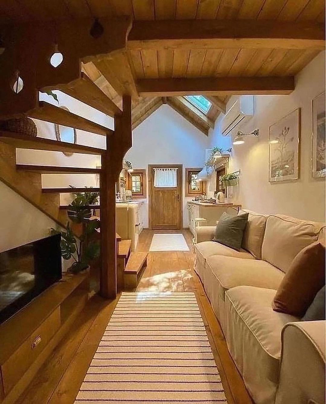 Cozy attic living room with warm wooden accents