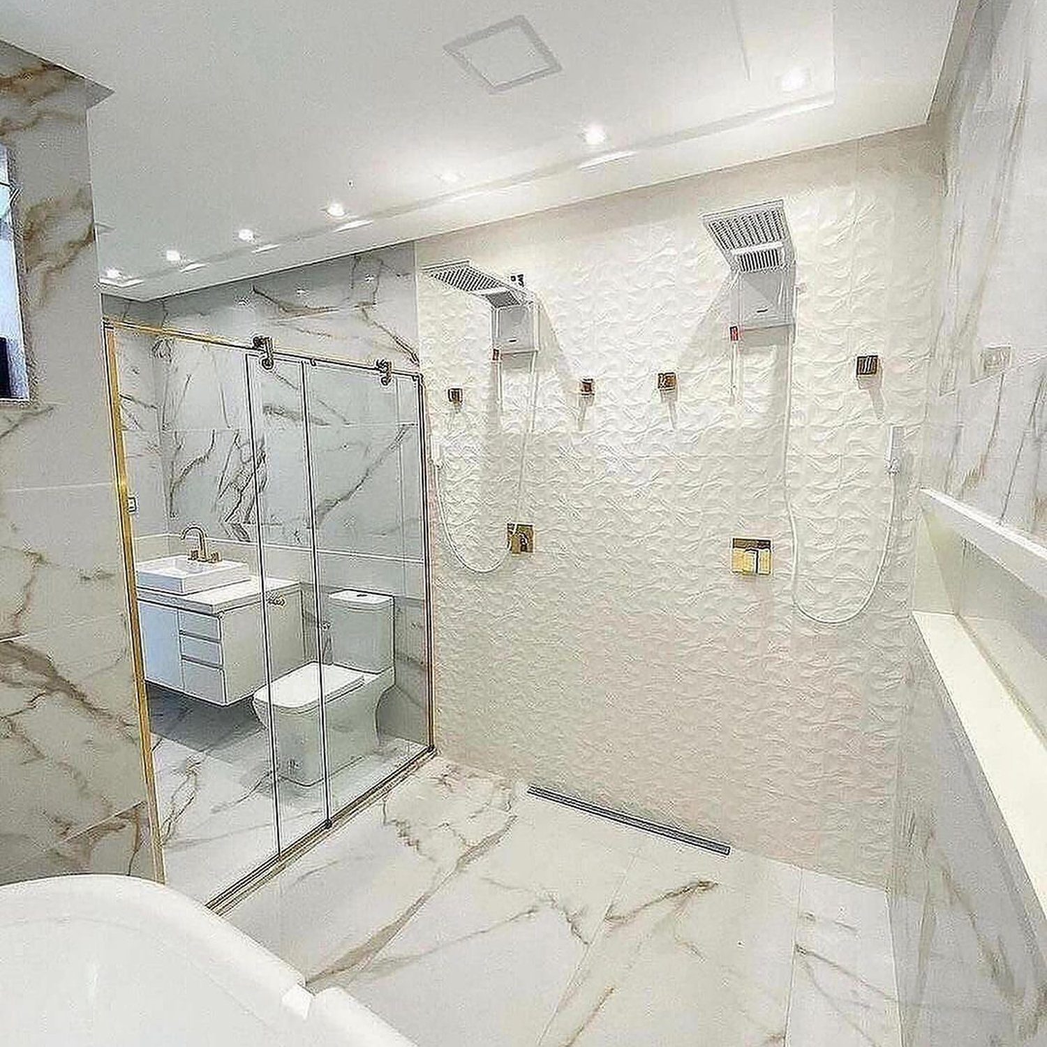 Luxurious marble bathroom with glass shower