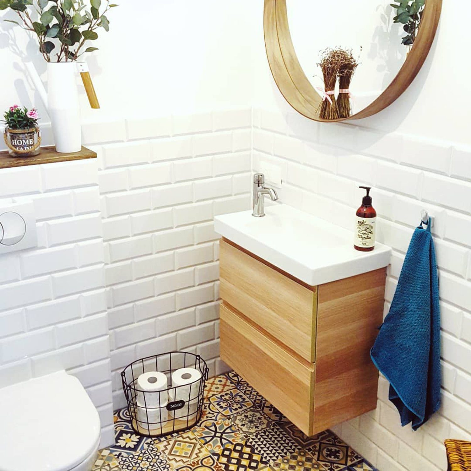 A stylish bathroom with eclectic tile work