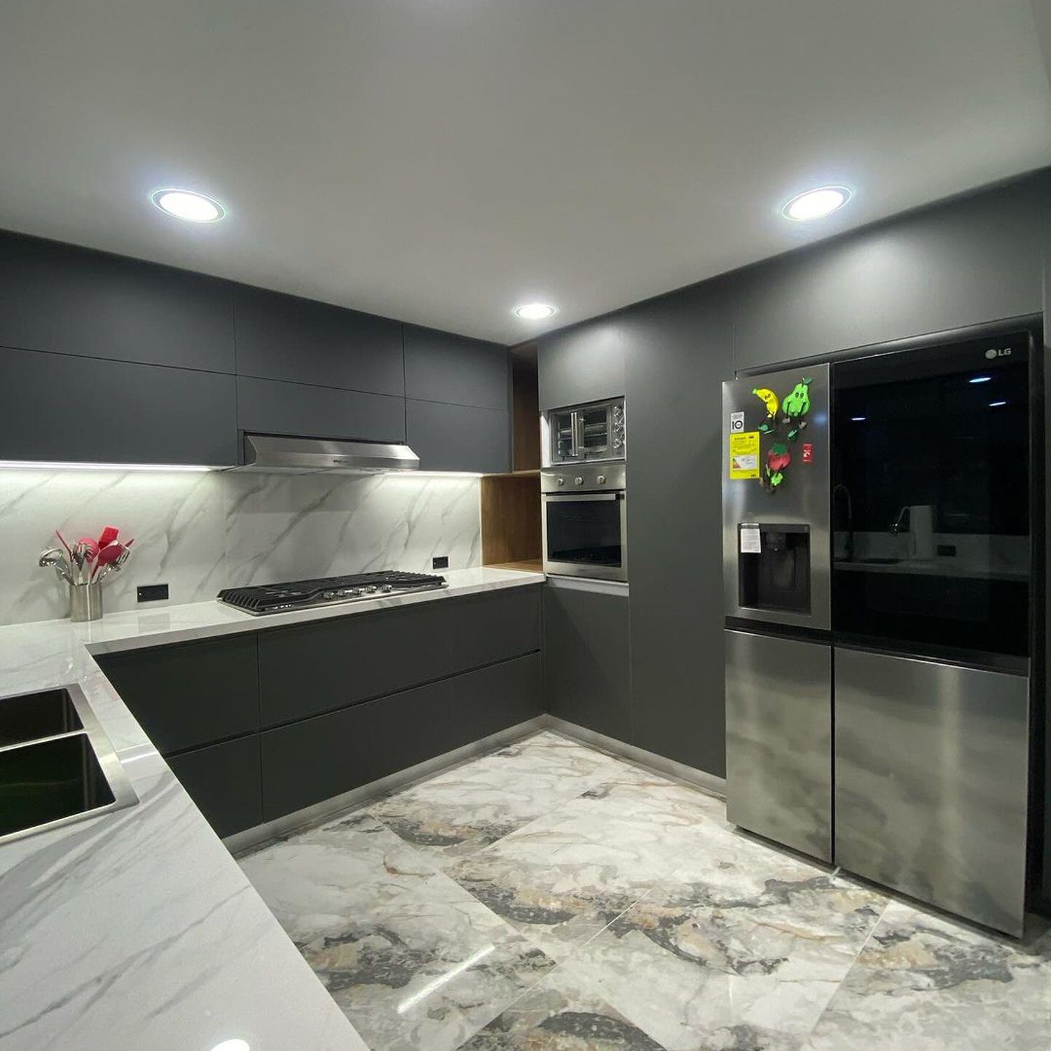 A sleek and modern kitchen with sophisticated finishes