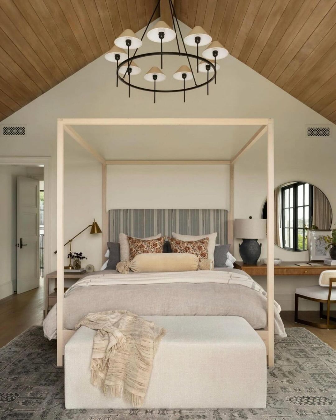 A tastefully designed bedroom featuring a four-poster bed