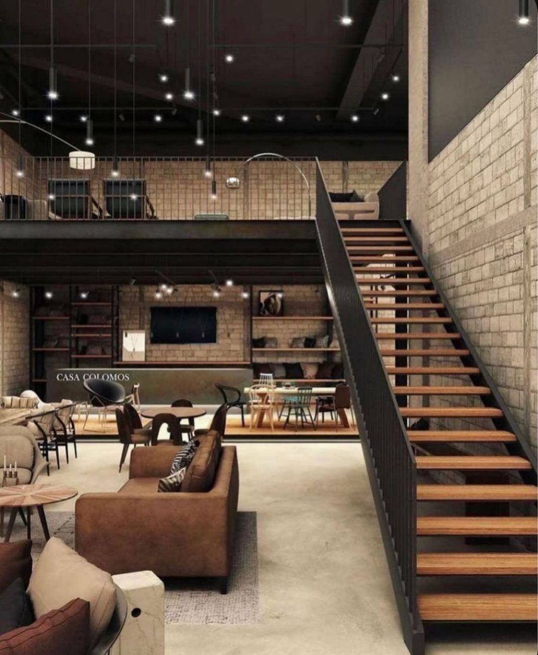 Loft-style living area with high ceilings and a mezzanine