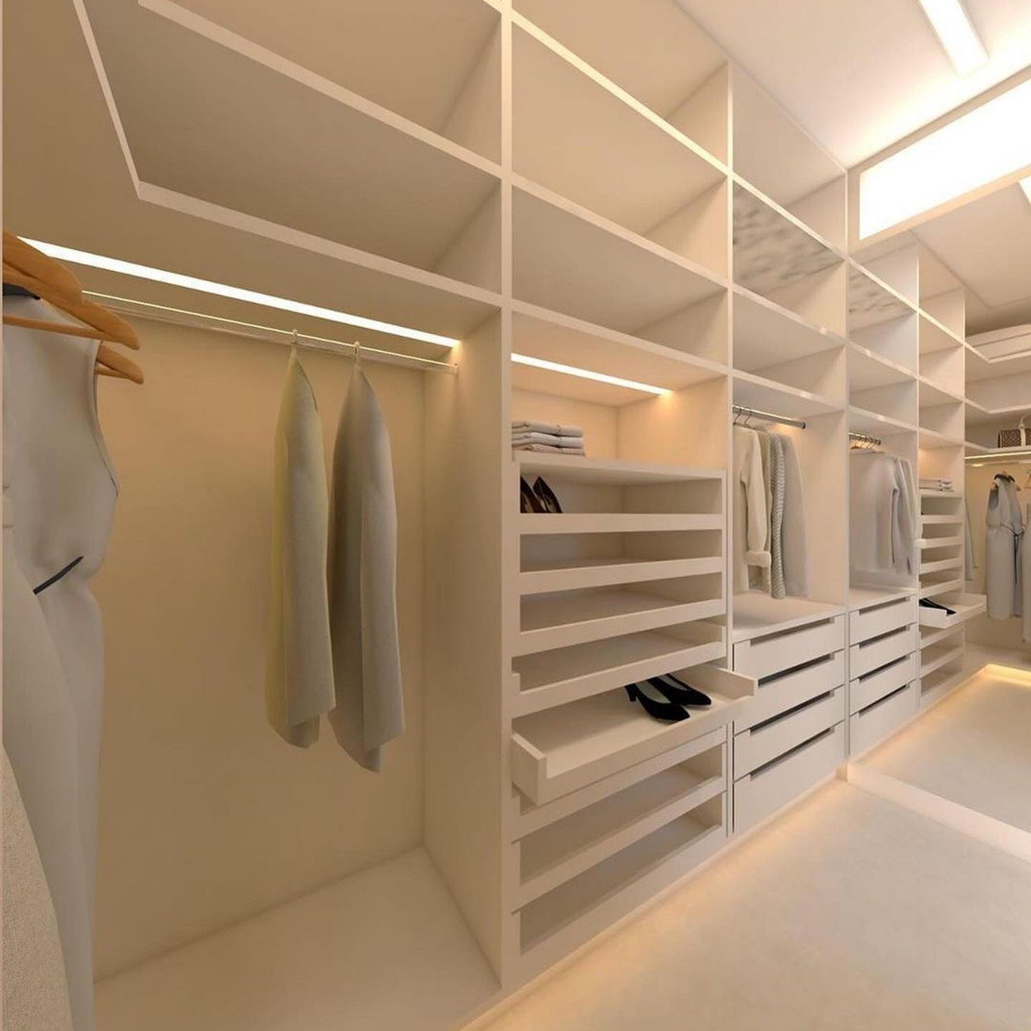 A modern, minimalist walk-in closet with strategic lighting