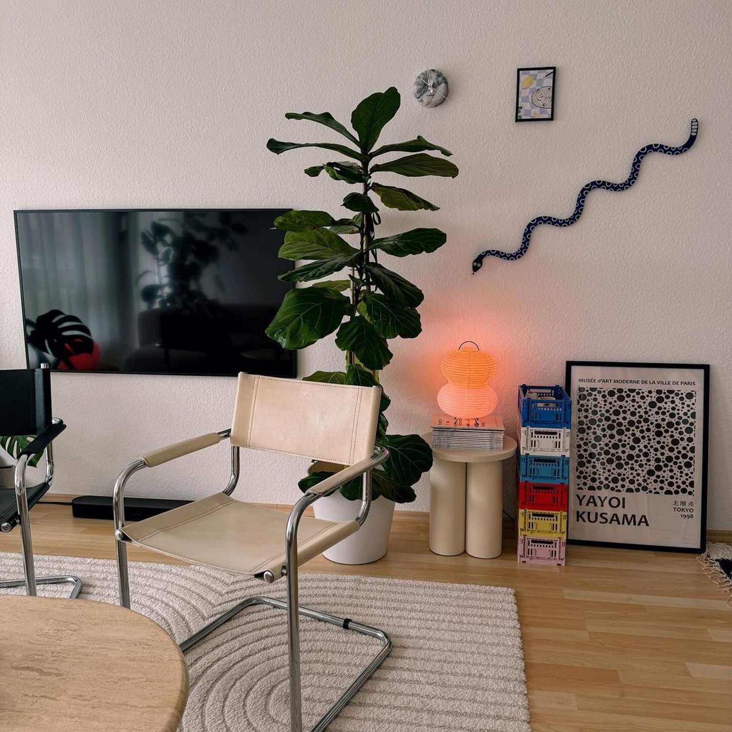 A harmoniously arranged living room corner with a focus on minimalist design elements.