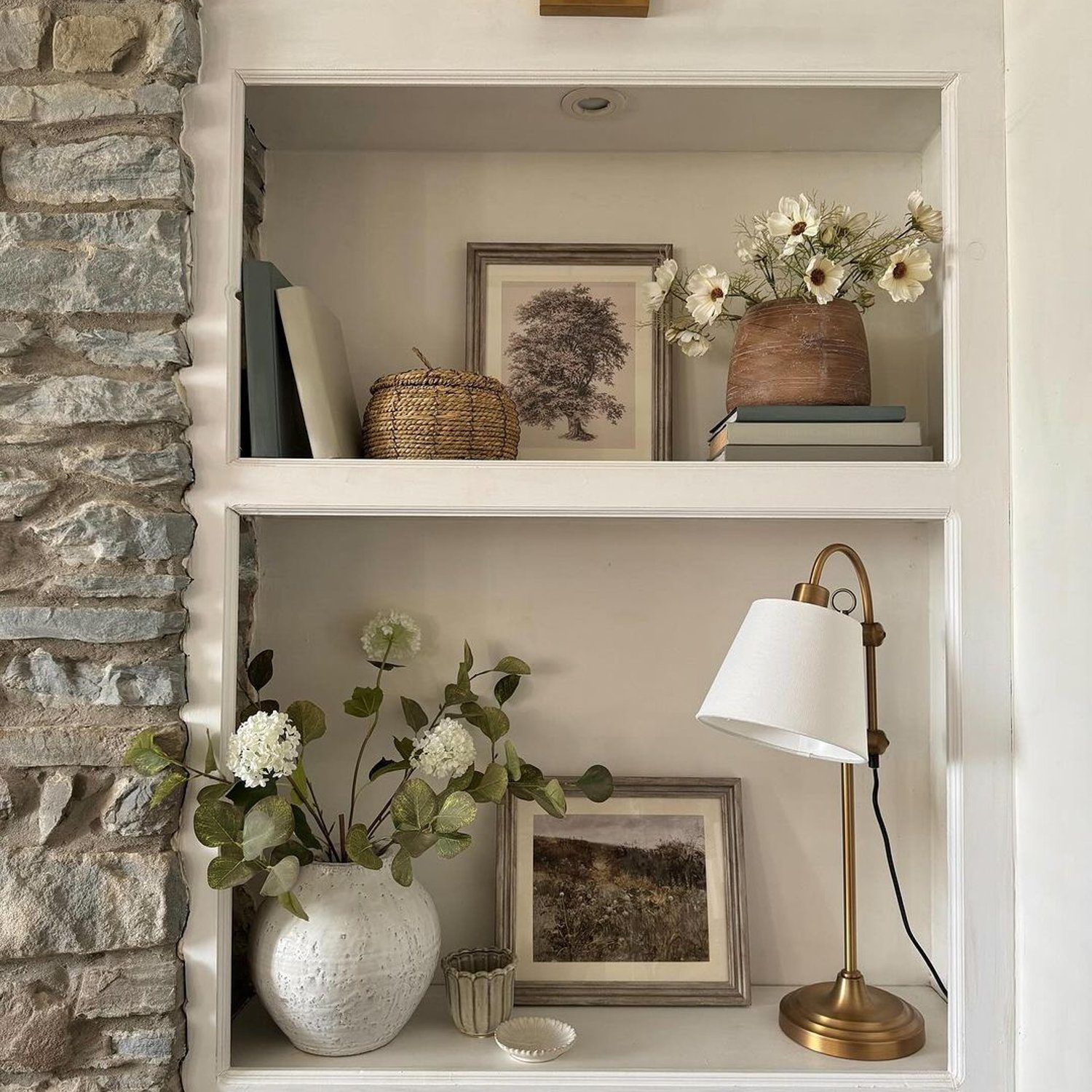 Cozy shelf styling with natural elements