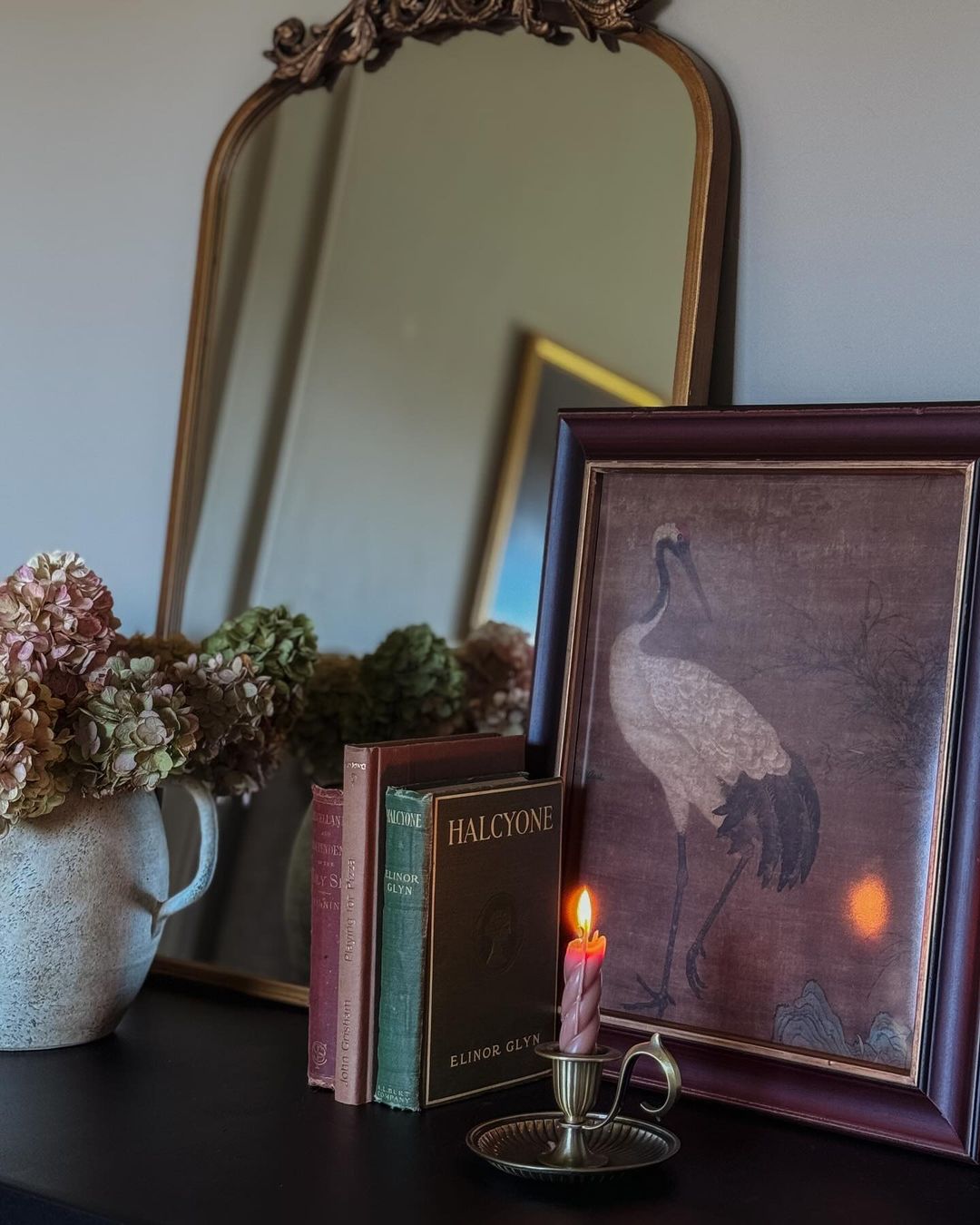 Vintage-style vignette with floral and bird elements