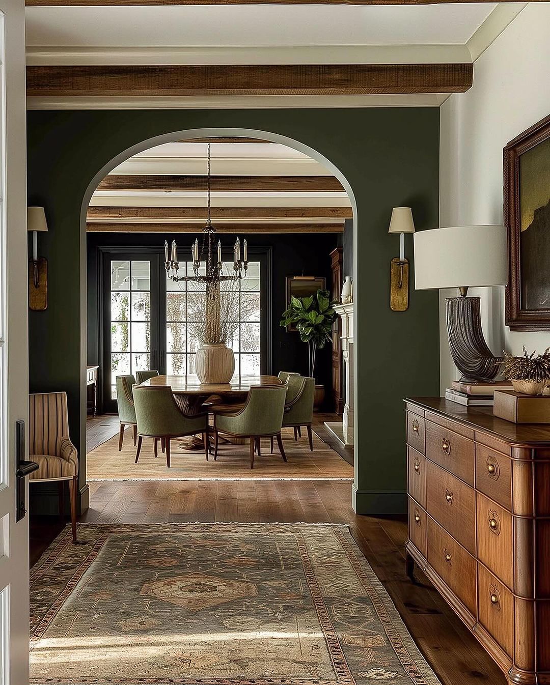 A harmoniously designed dining area with an archway