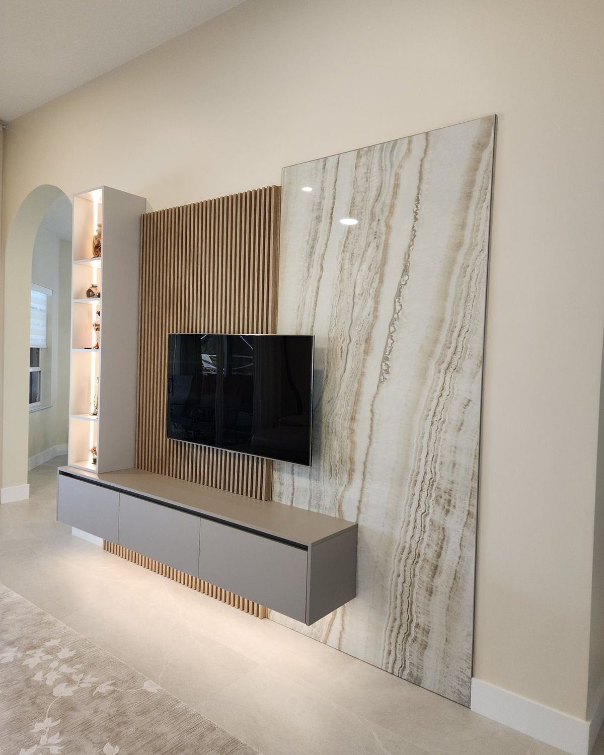 Contemporary living room with a unique entertainment wall