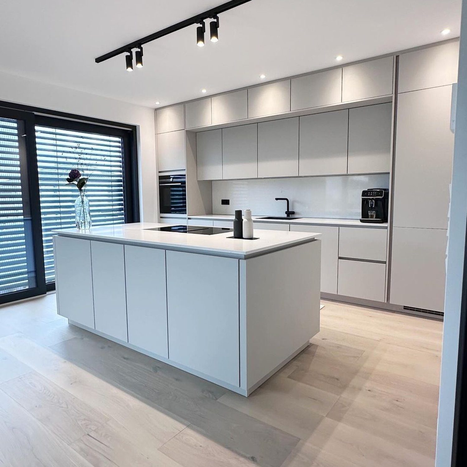 Modern and sleek kitchen design featuring clean lines and minimalistic style