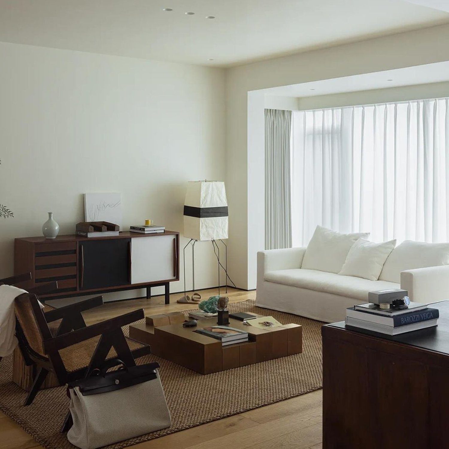 A minimalistic living room with natural light