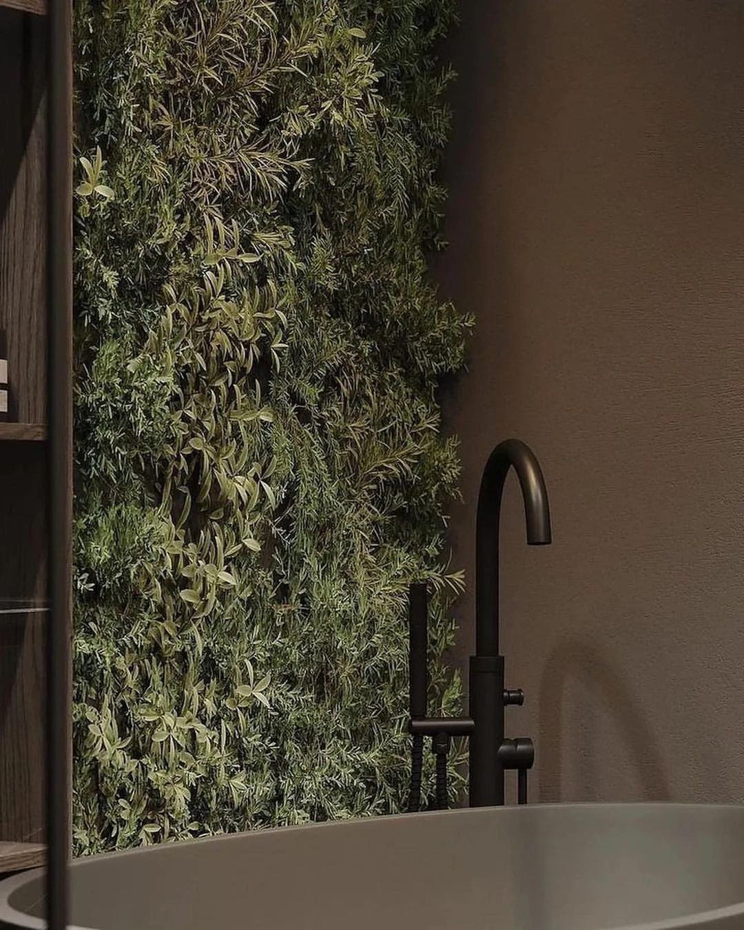 A modern bathroom featuring a vibrant green living wall