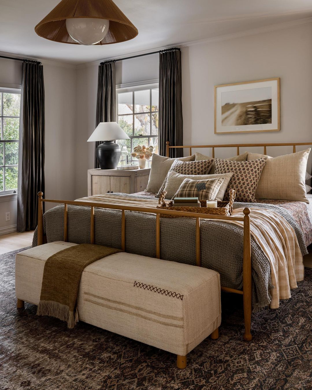 A well-appointed bedroom boasting a harmonious blend of textures and neutral tones