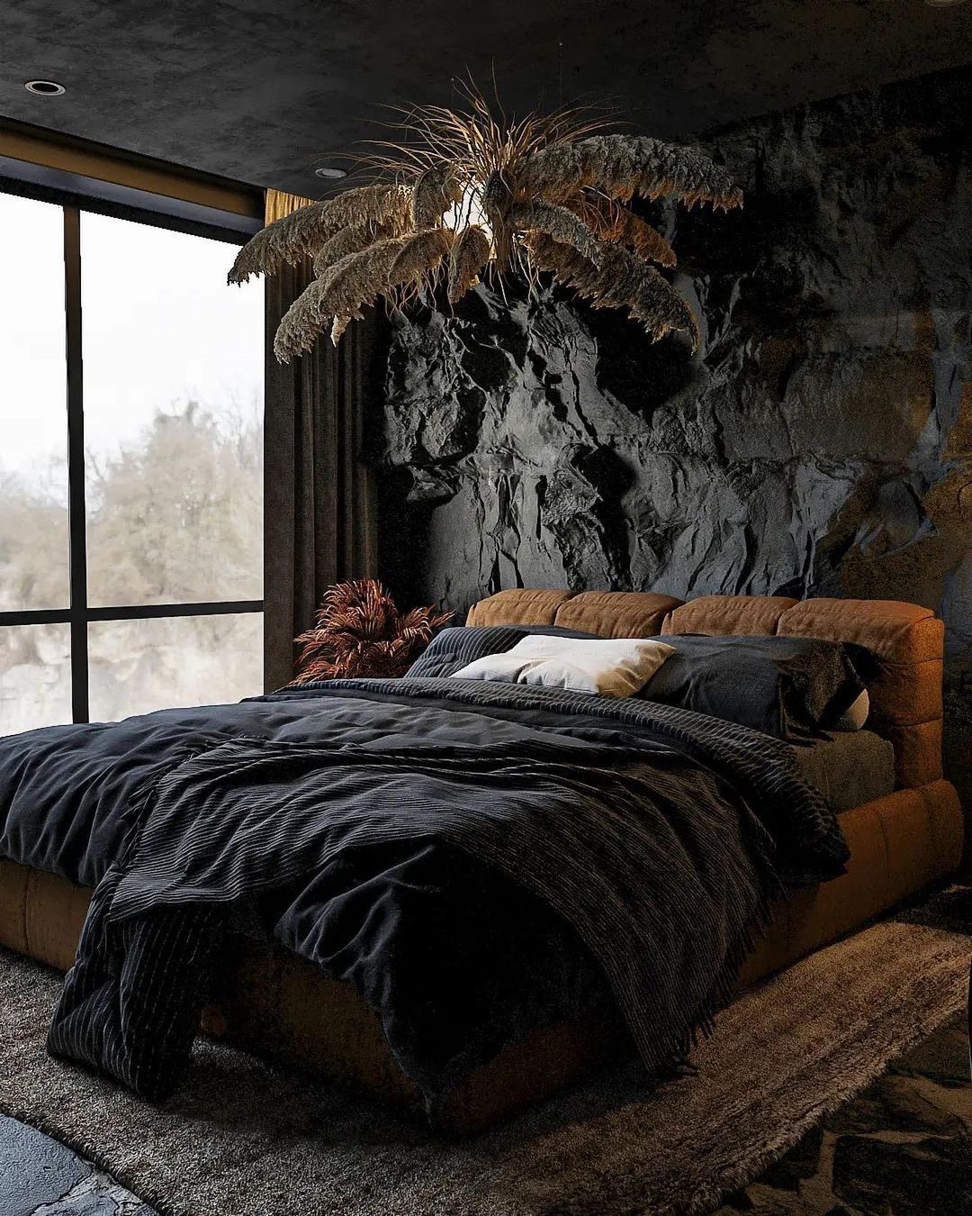 A dark themed bedroom with an organic touch