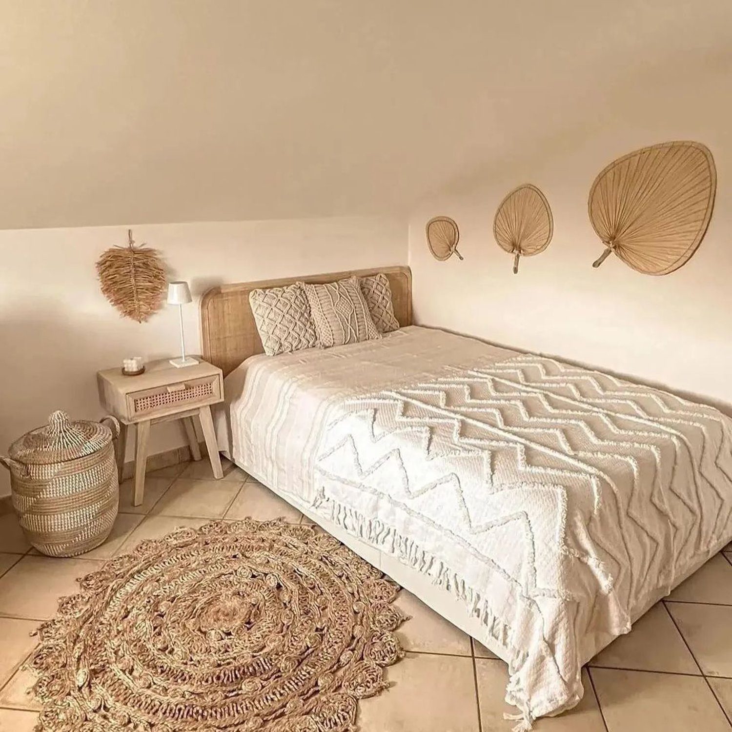 A harmoniously decorated bedroom with a bohemian flair