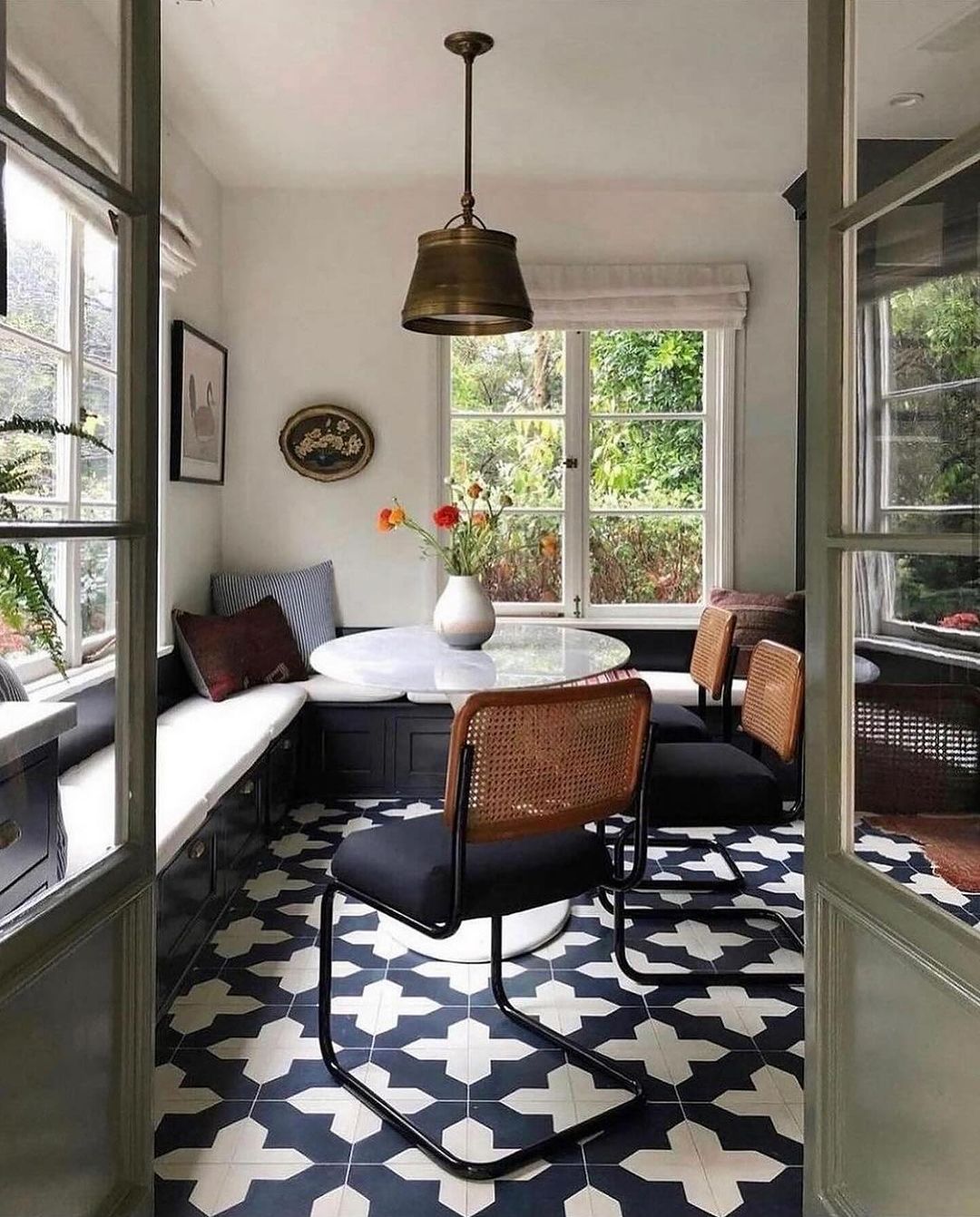 Chic dining nook with garden views