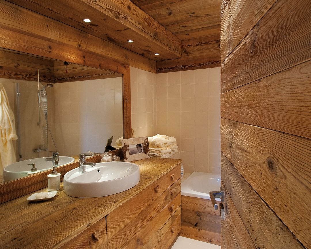 Rustic wooden bathroom with modern fixtures