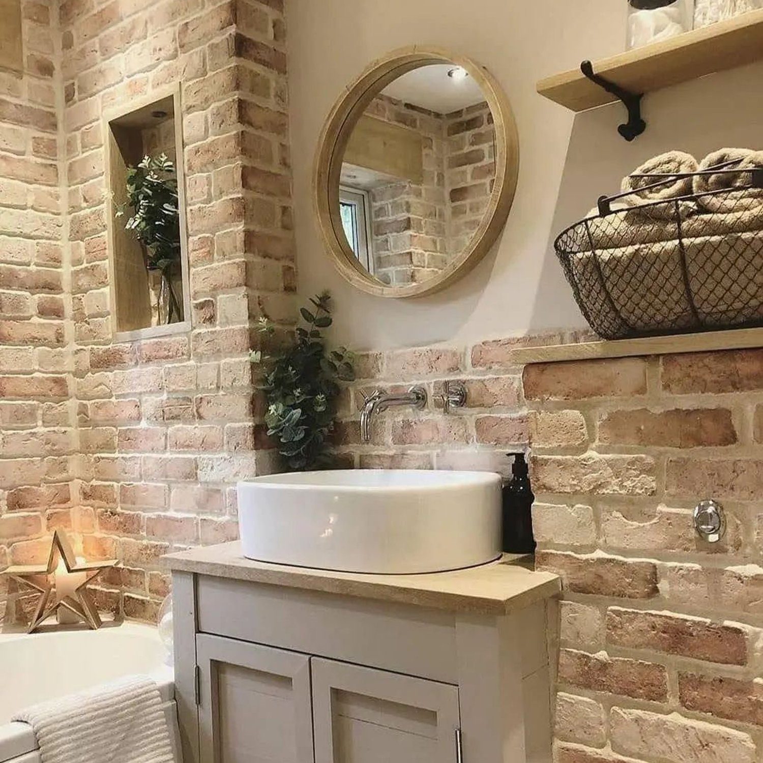 Charming rustic bathroom with exposed brick walls