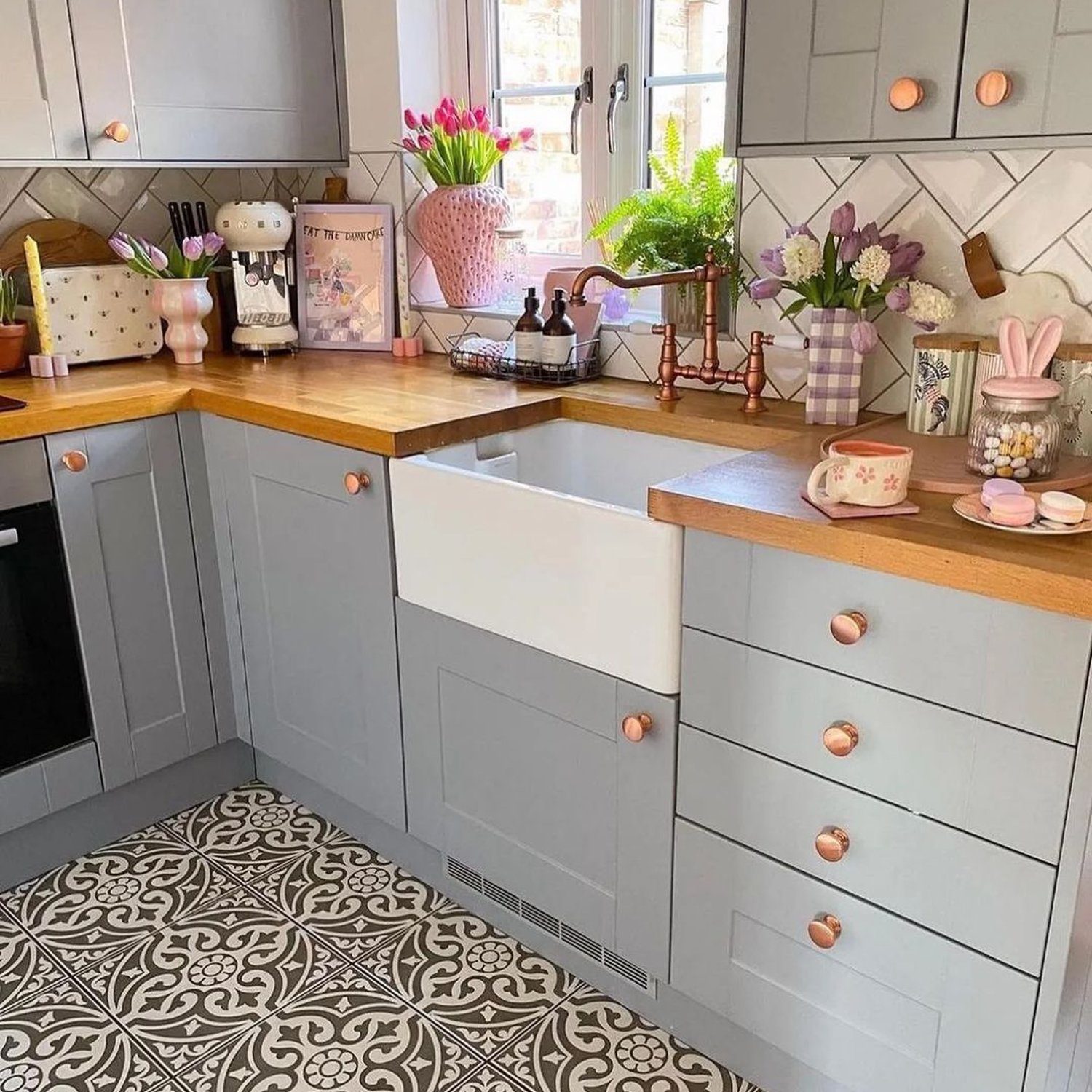 A stylishly arranged kitchen with a blend of modern and vintage elements