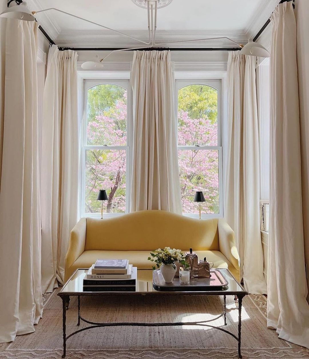 A serene living room with blossoming views