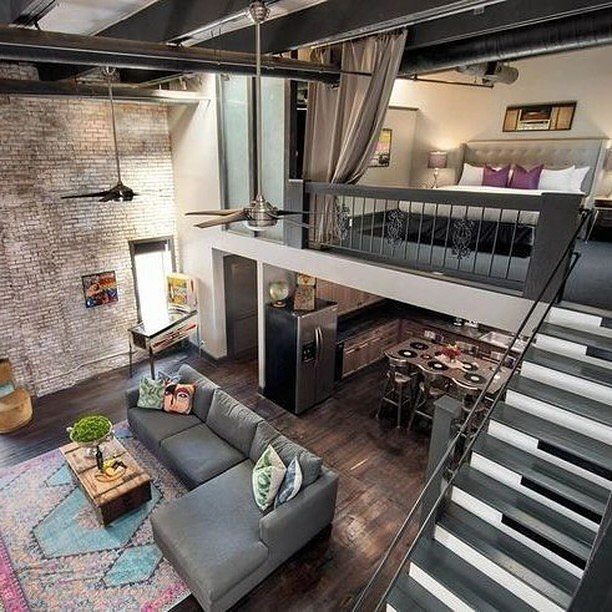 Loft apartment with high ceilings and industrial elements