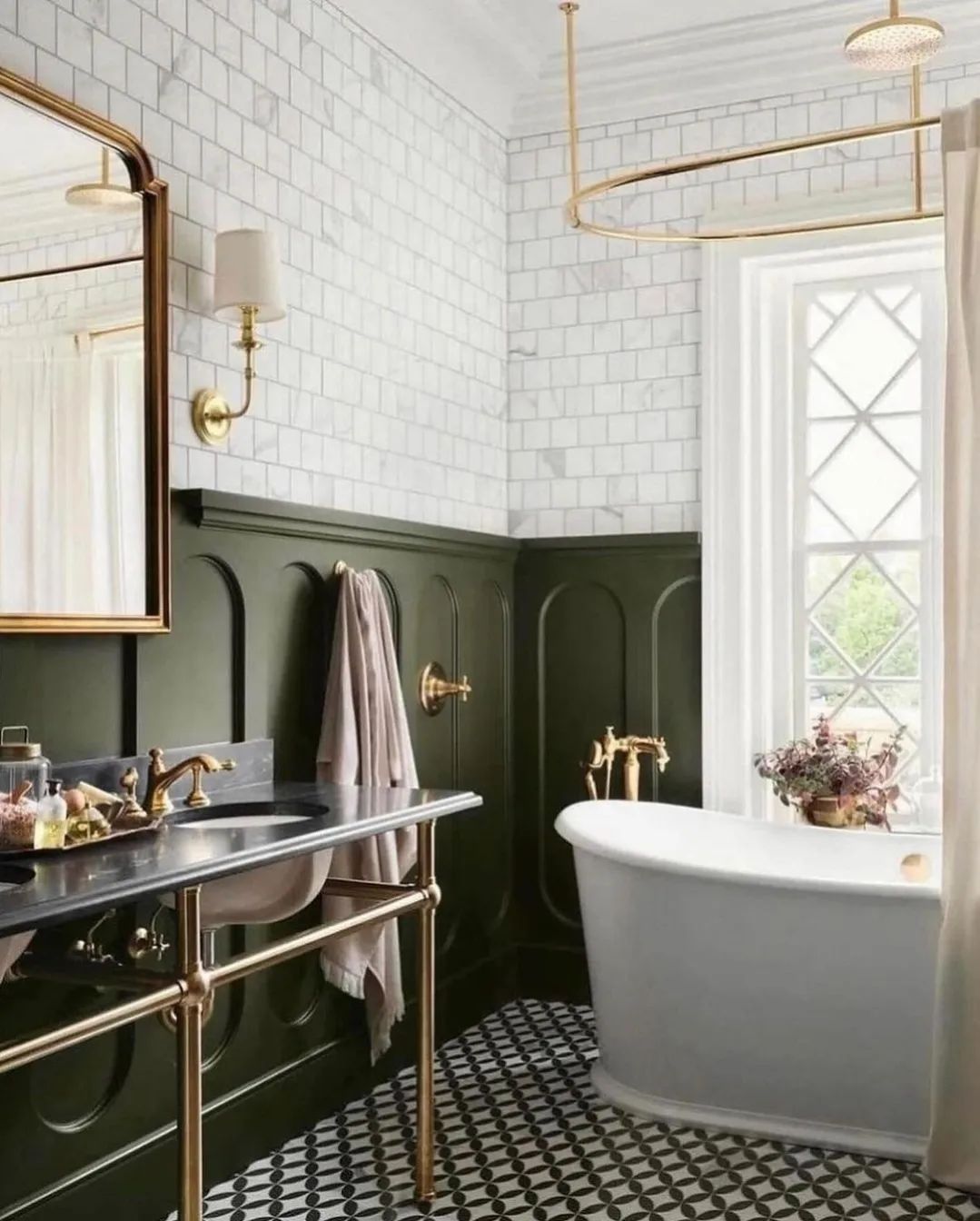 A chic modern bathroom with half-subway-tiled walls