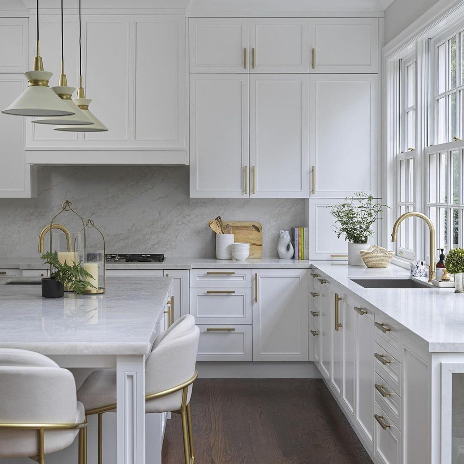 Elegant white kitchen with gold accents