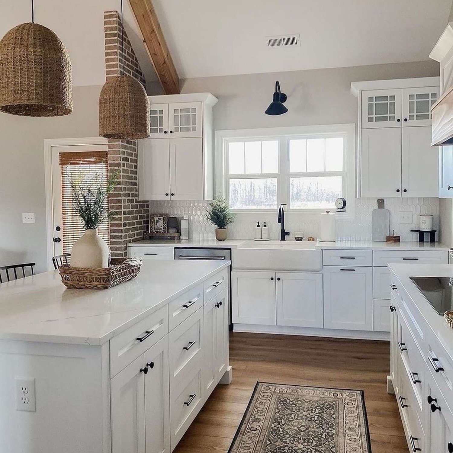 Elegant white kitchen with natural accents