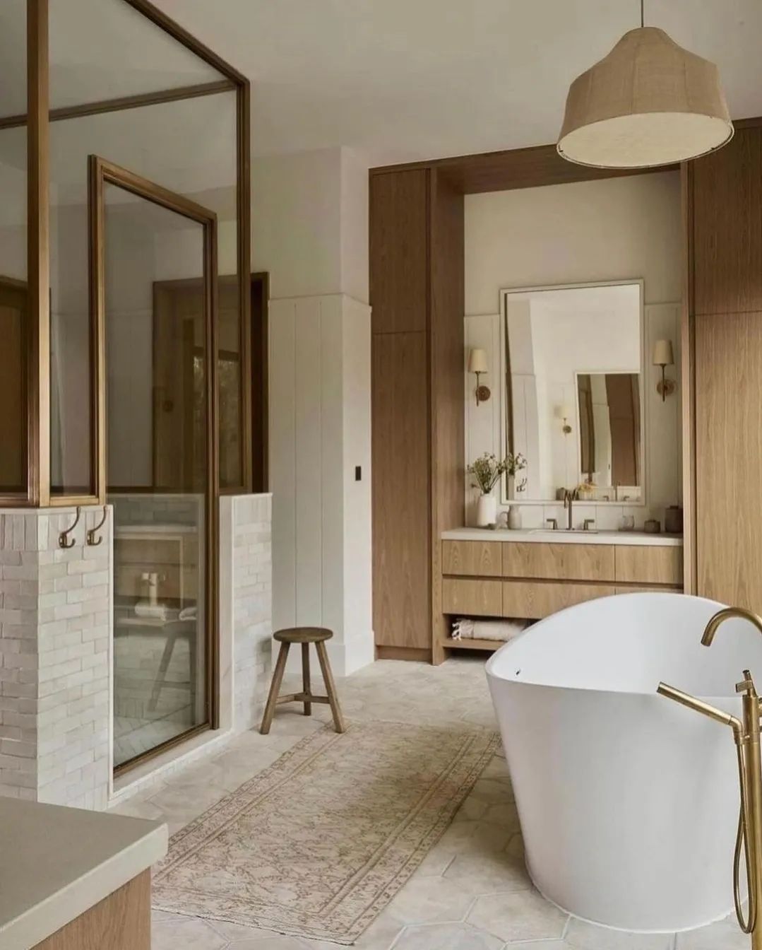 A modern bathroom design featuring natural wood and neutral tones.