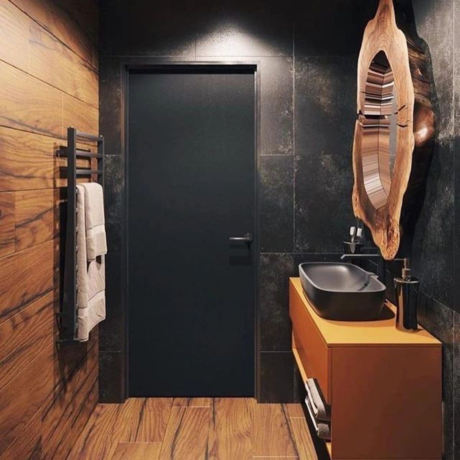 A modern bathroom featuring dark tones and wooden textures