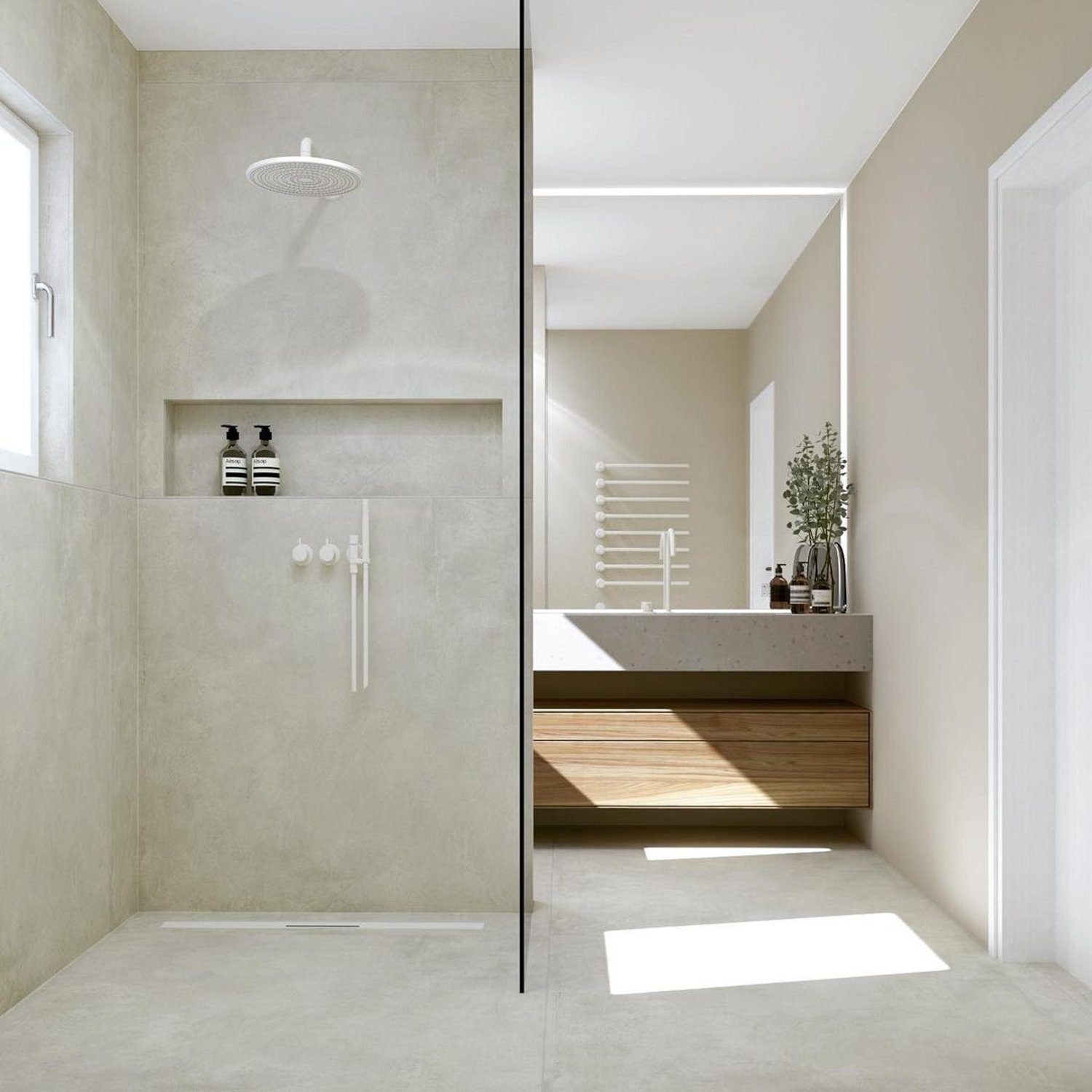 A sleek and modern bathroom design showcasing a minimalist approach with concrete textures and wooden accents.