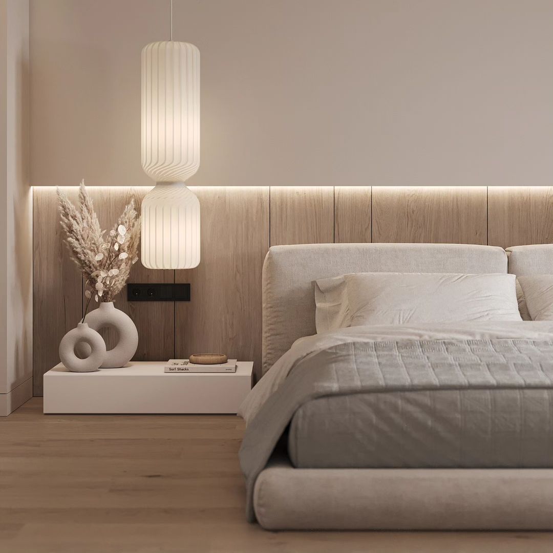 A modern minimalist bedroom featuring smooth wooden textures and soft lighting.