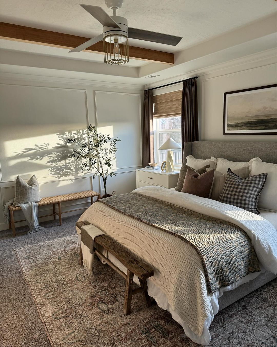 A well-appointed bedroom with warm natural light