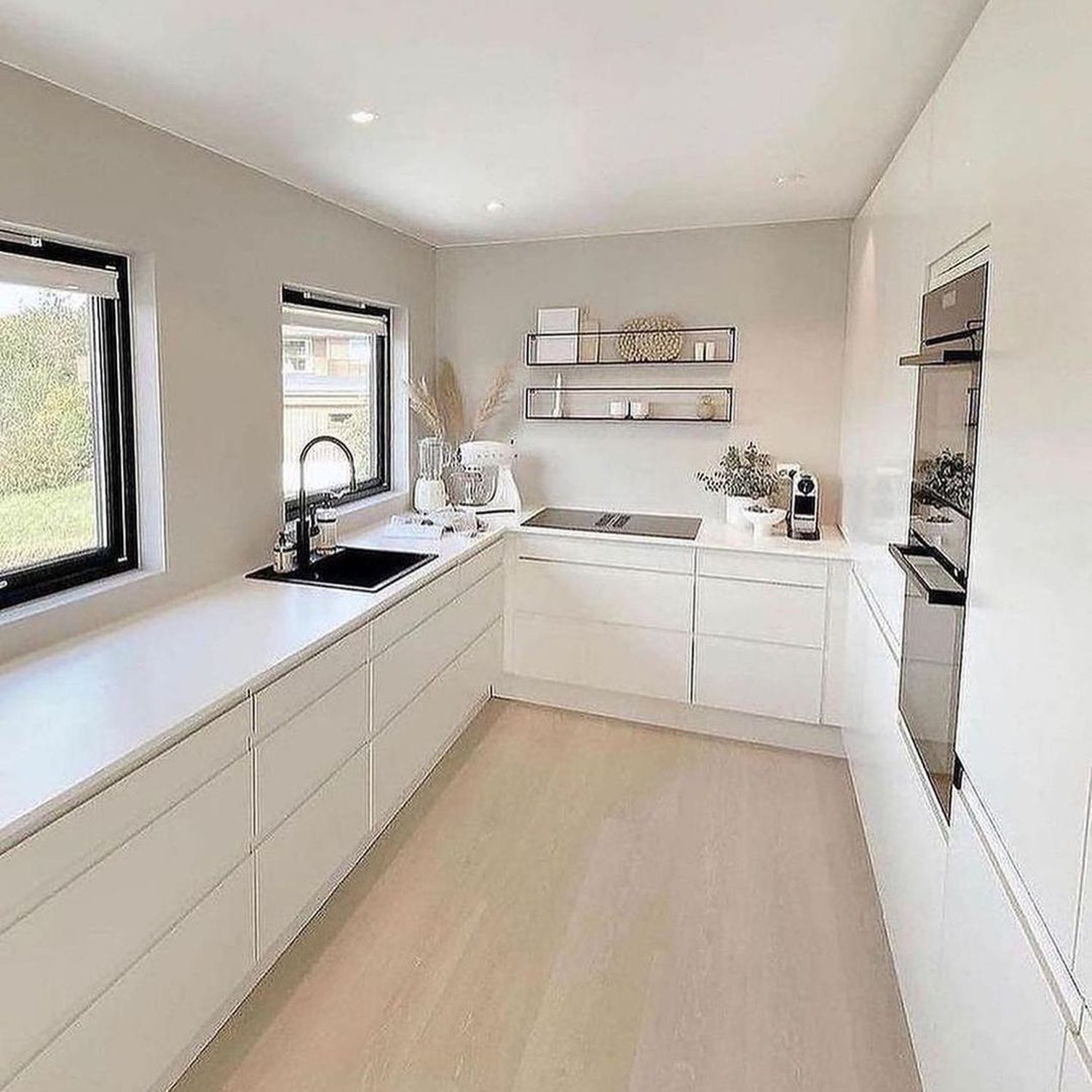 Modern, minimalist kitchen with ample natural light