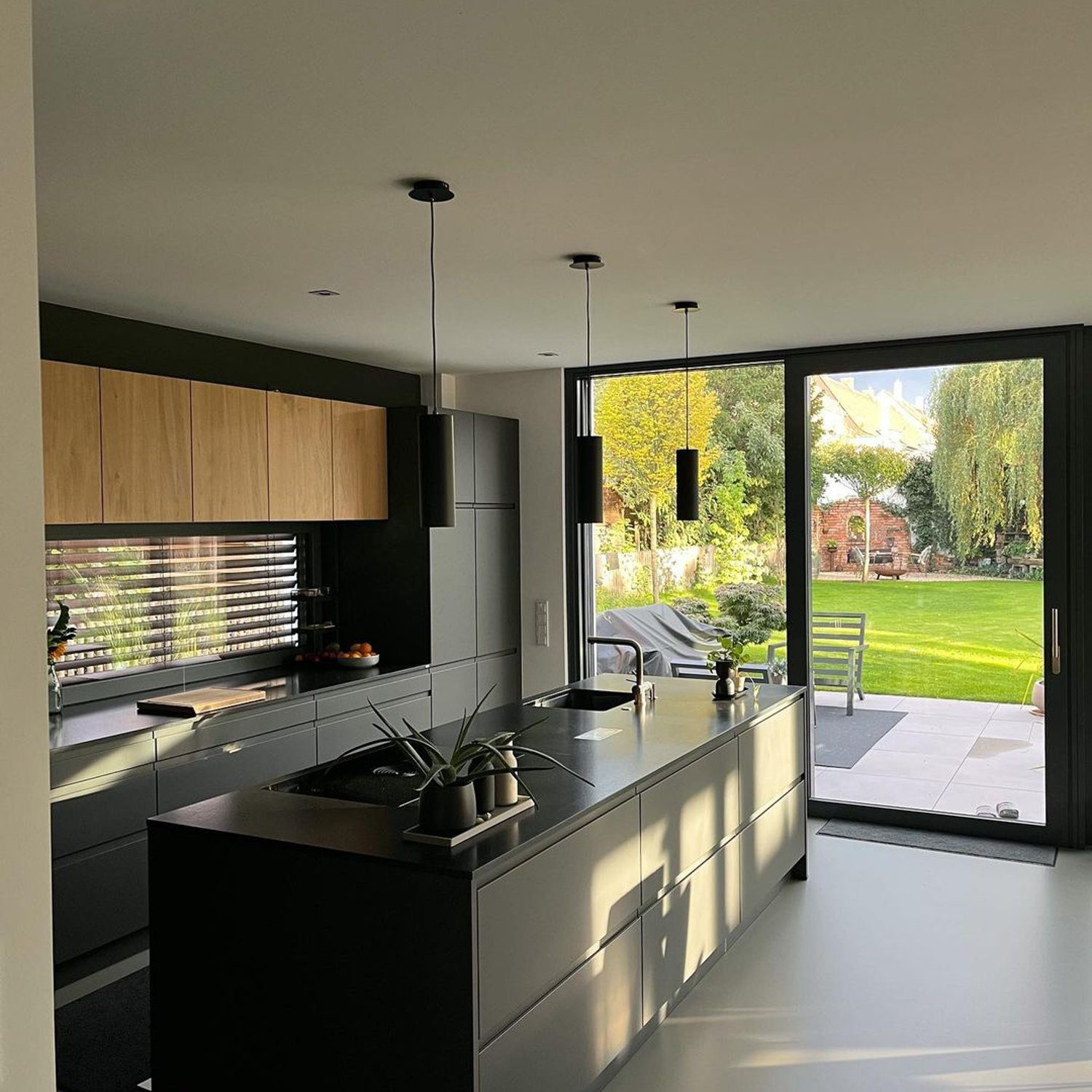 Modern Kitchen Overlooking a Lush Garden