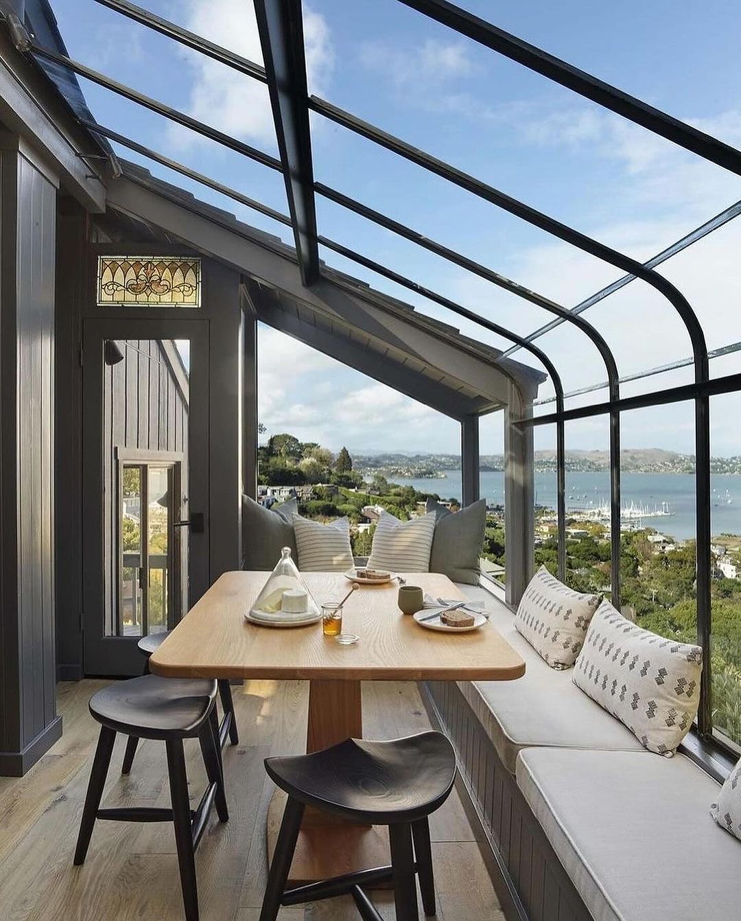 Contemporary sunroom with panoramic views