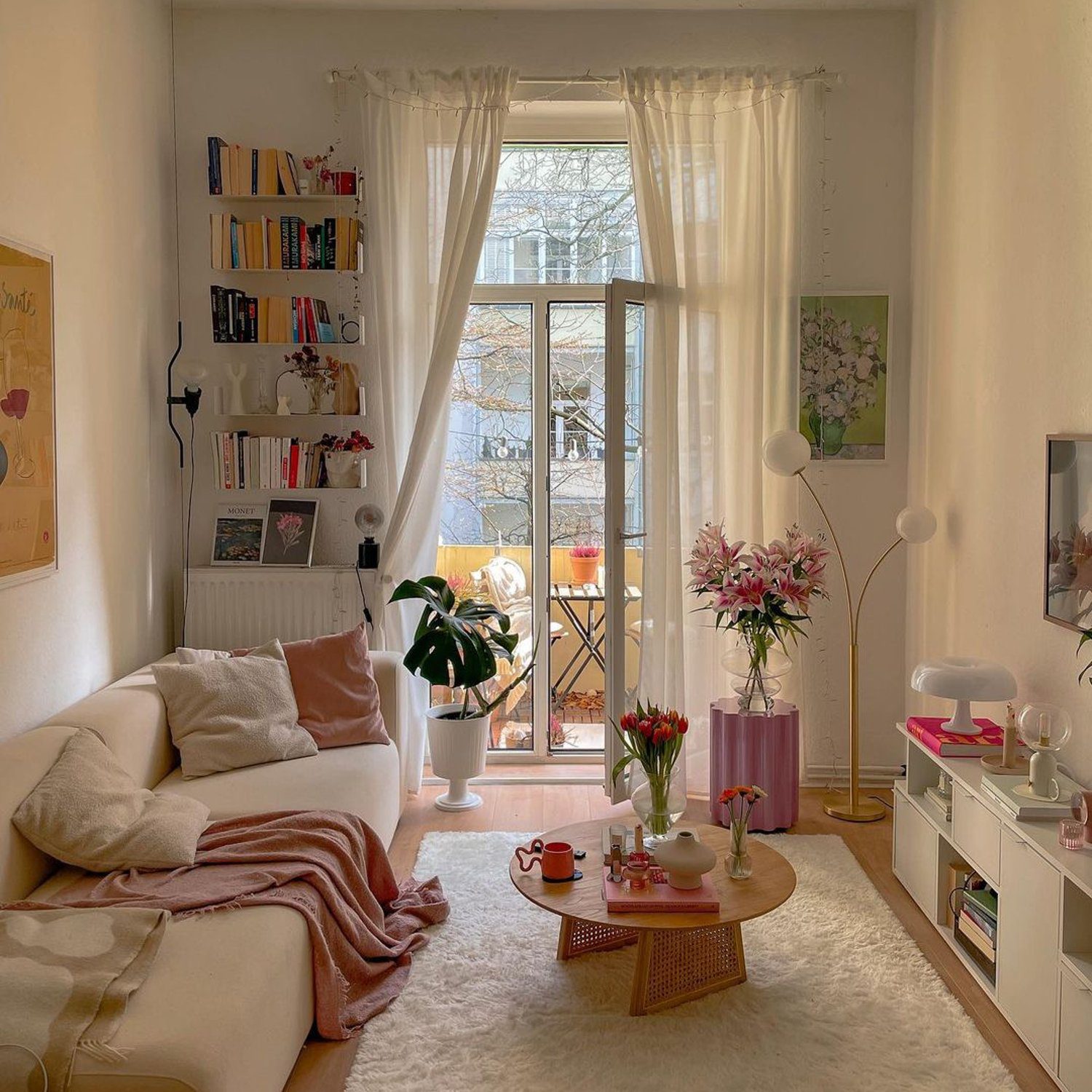 A soothing living room with ample natural light and cozy decor