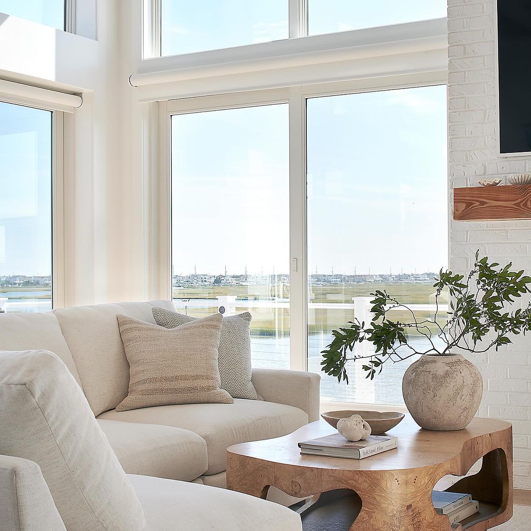 A serene living room with expansive windows