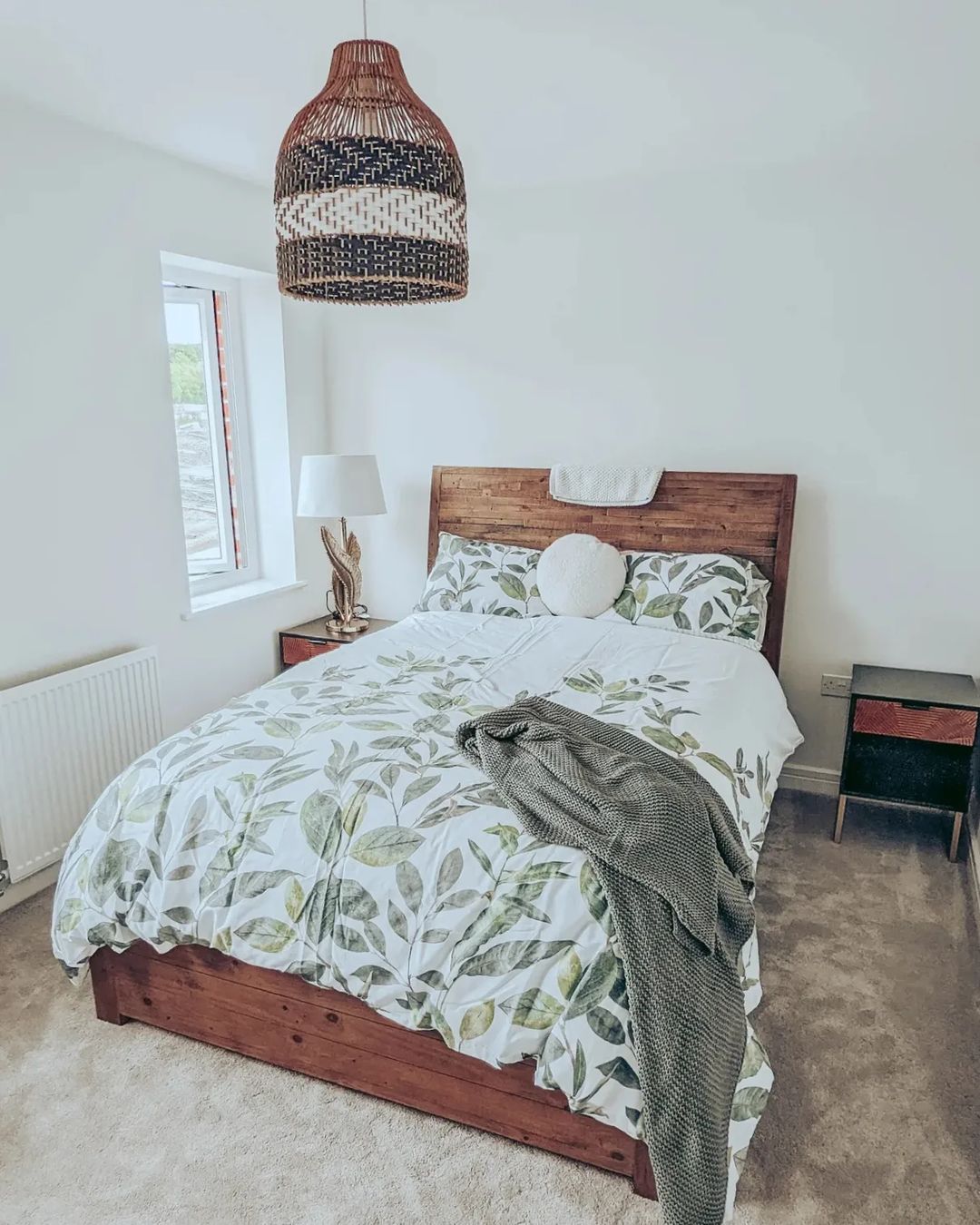 A modern bedroom with a botanical theme