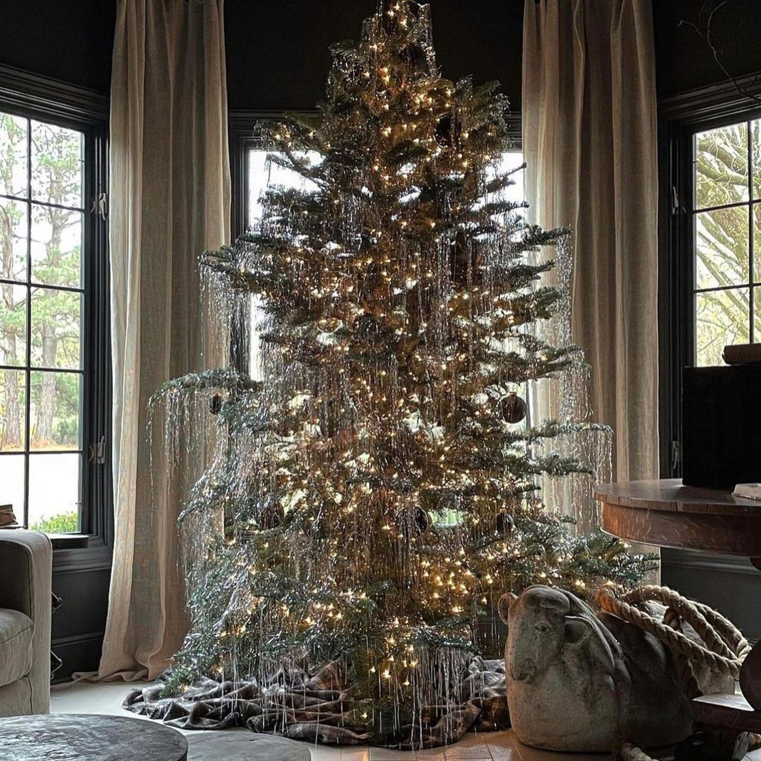 Elegantly decorated Christmas tree in a cozy room setting