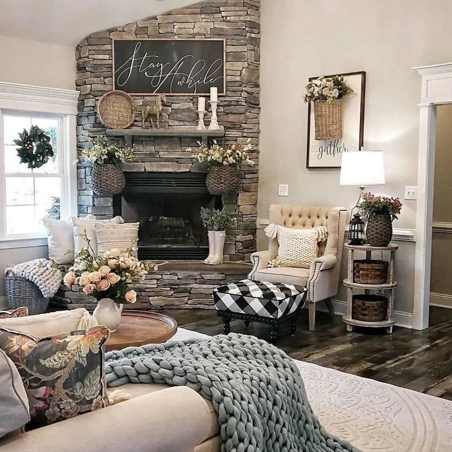 Cozy and elegant living room with a stone fireplace