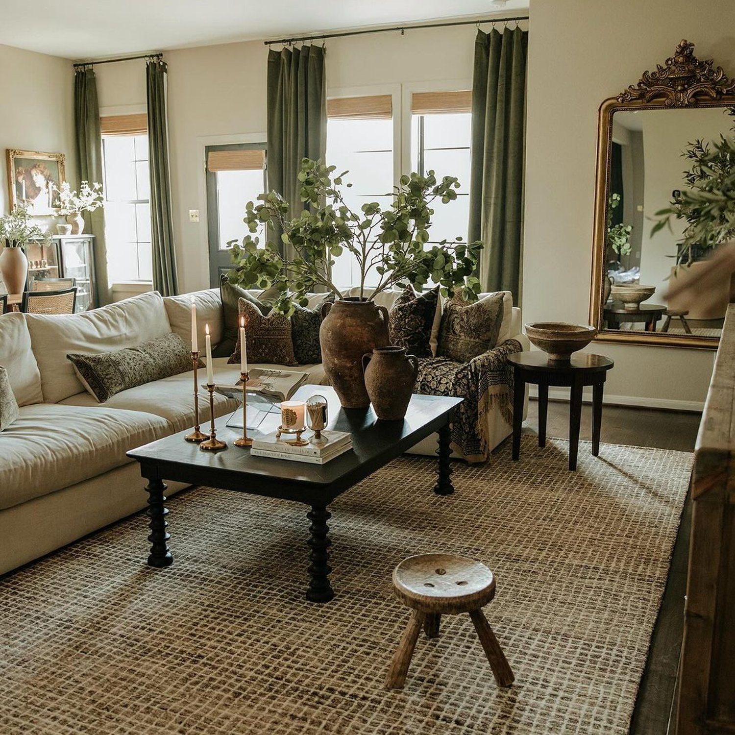 A tastefully decorated living room with natural tones