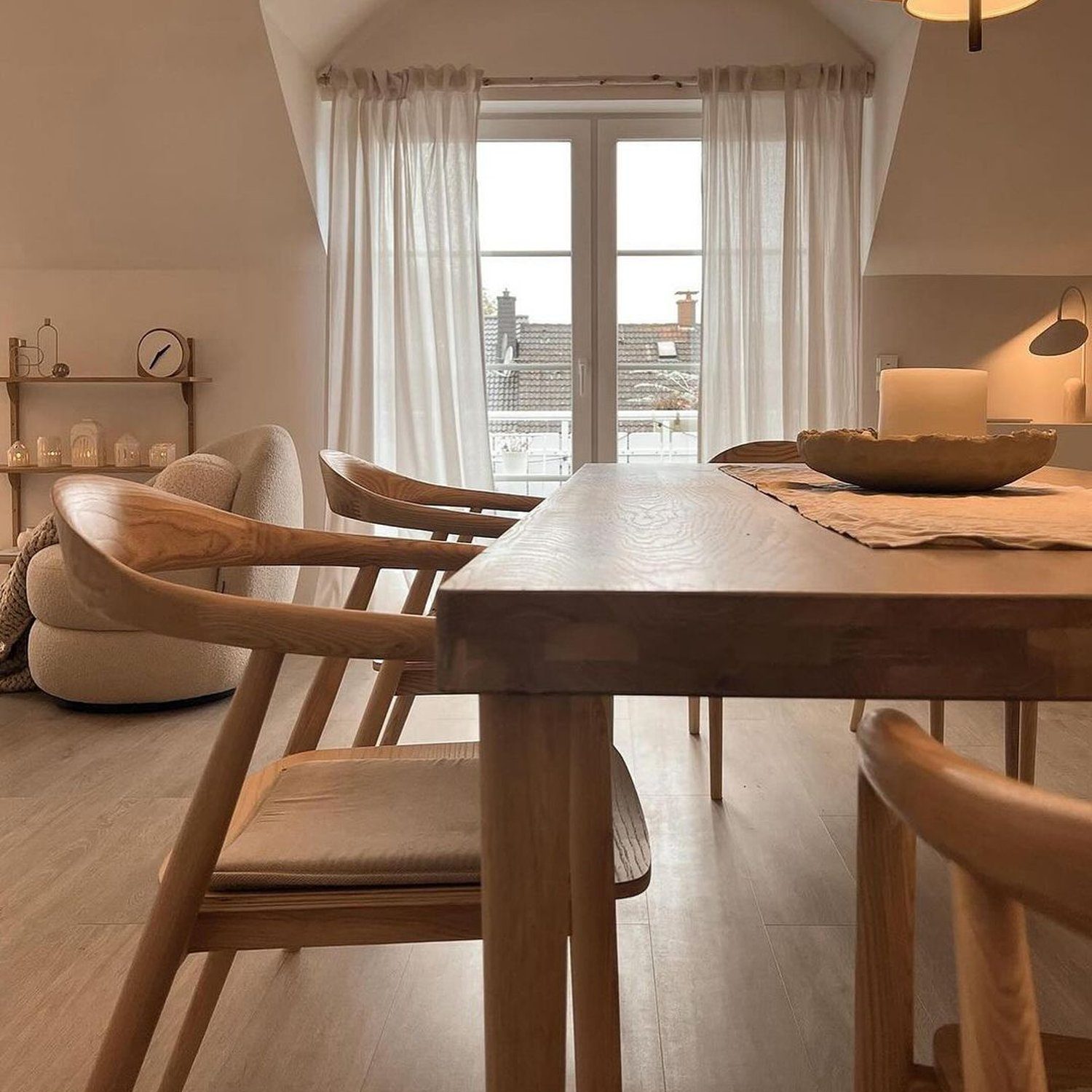 Cozy and minimalist dining area with natural wood tones