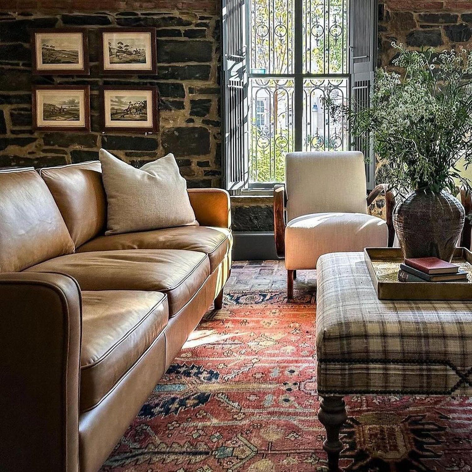 Elegant living room with exposed brick and classic decor