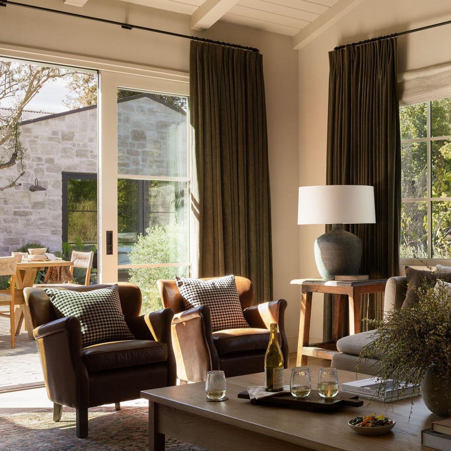 Elegantly appointed living room with natural light