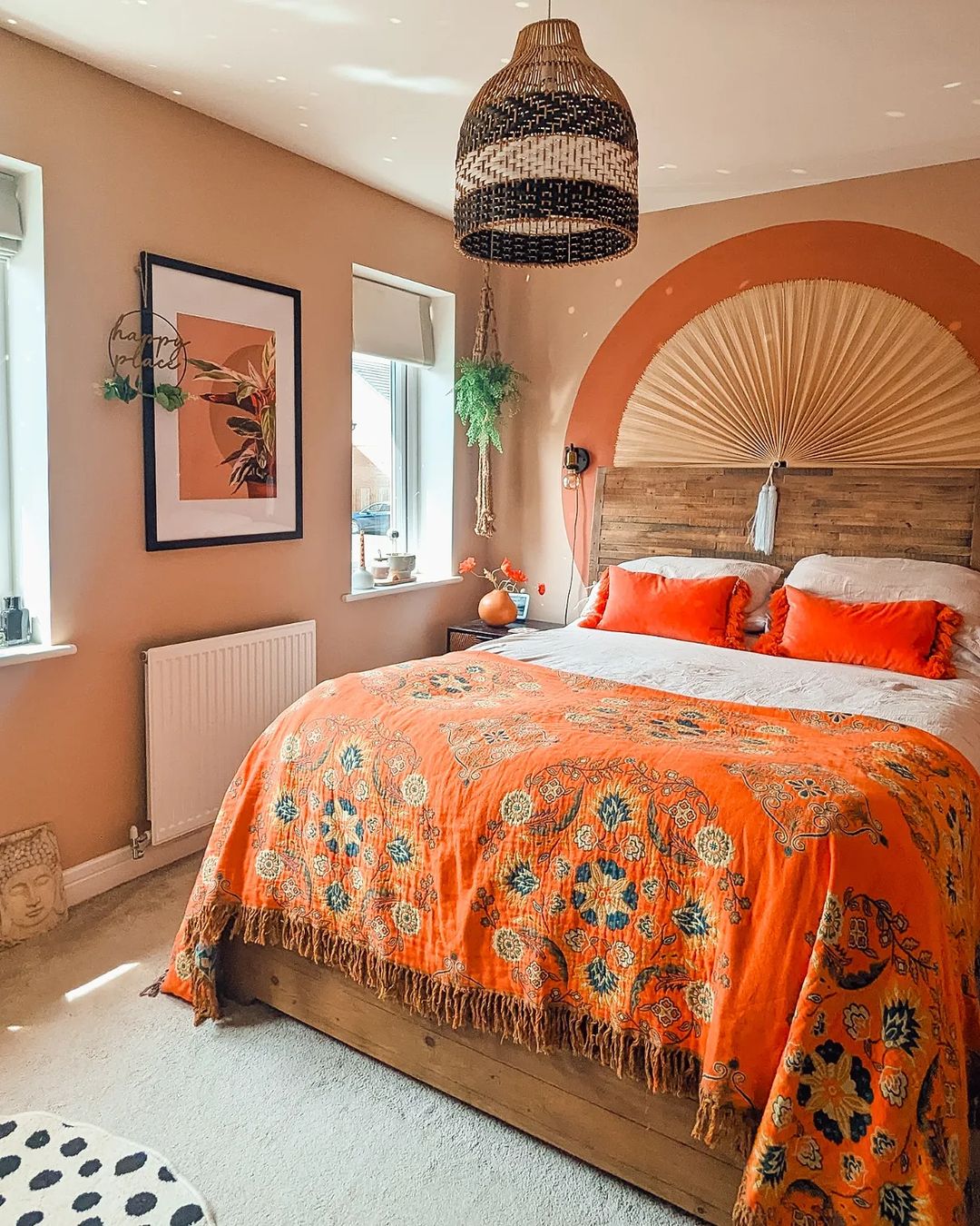 A warm and vibrant bedroom with eye-catching decor