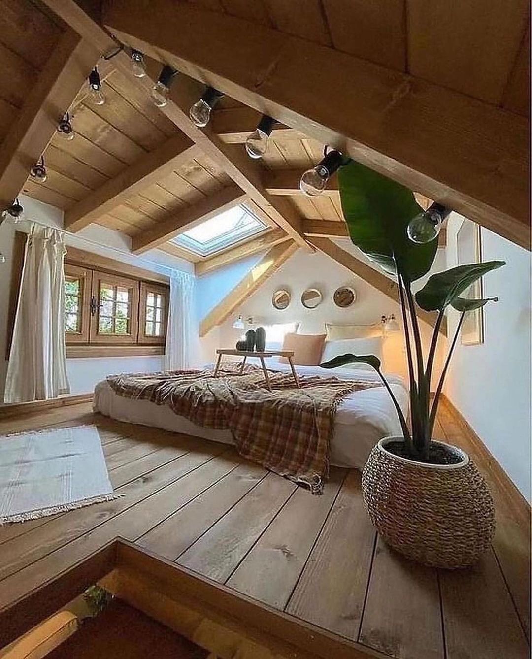 Cozy attic bedroom with natural light