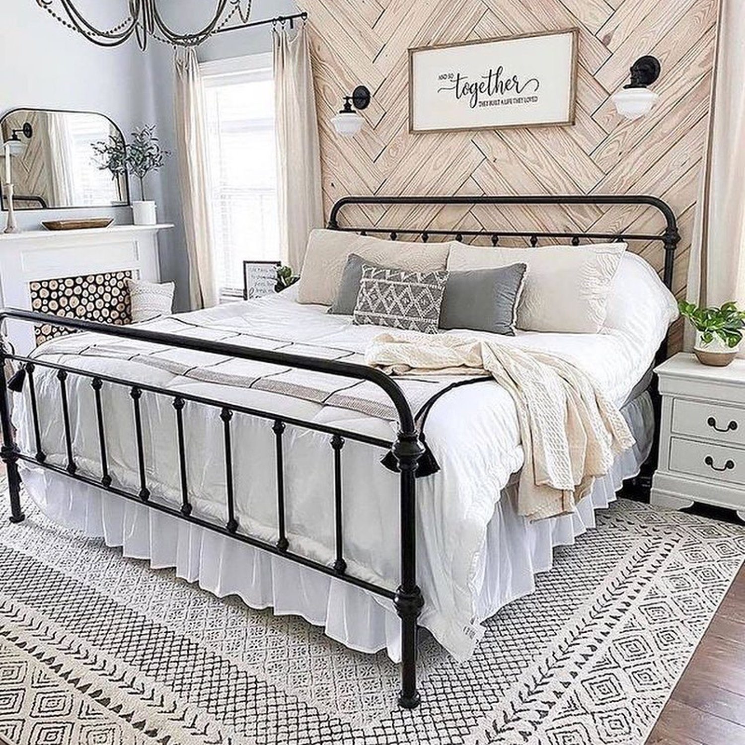 Cozy and stylish bedroom with a herringbone accent wall