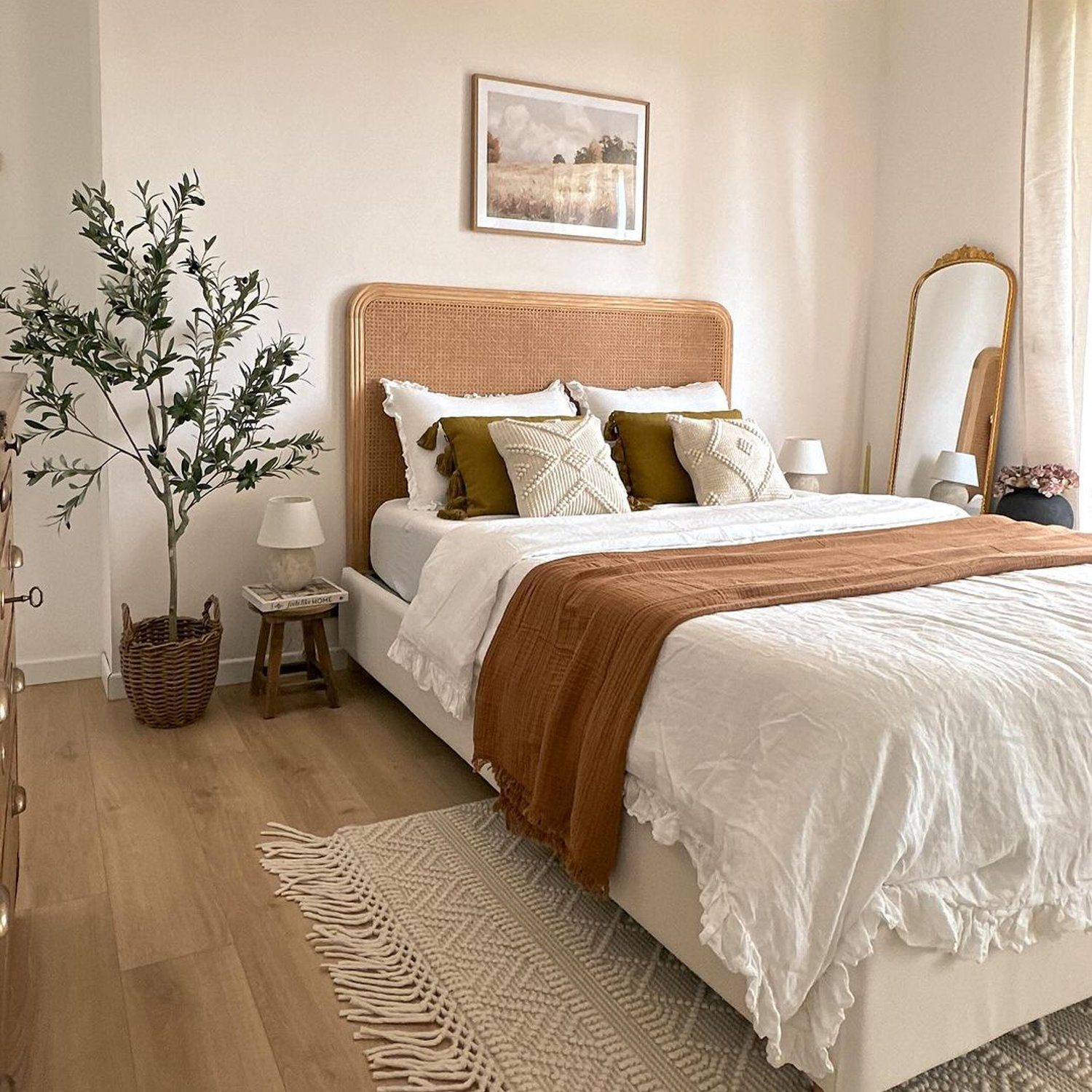 A cozy and inviting bedroom featuring a natural color palette