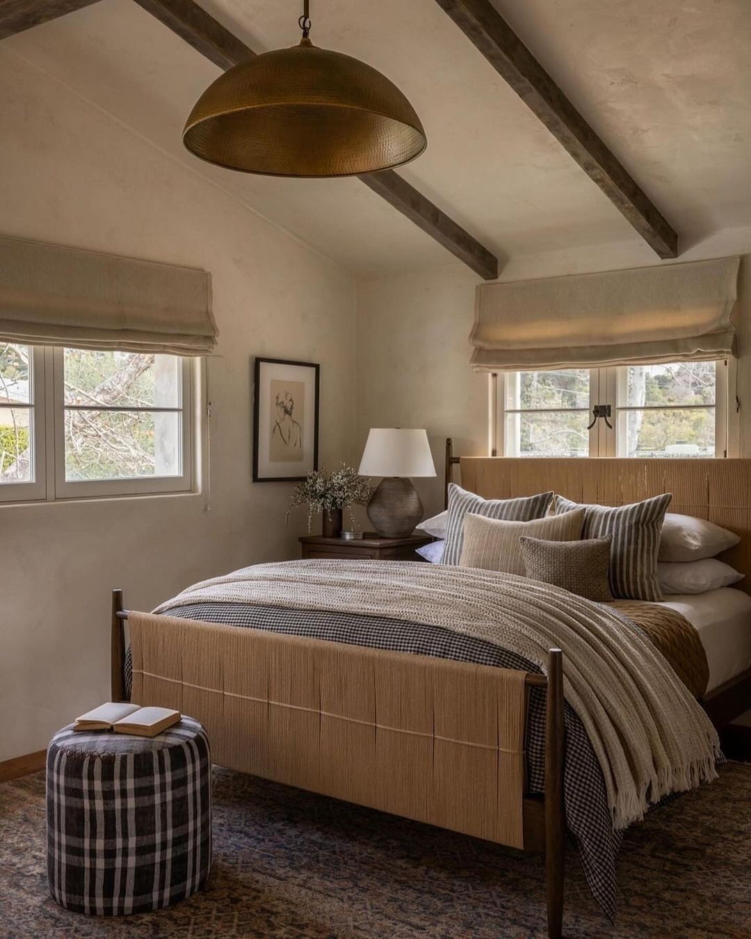 A cozy bedroom featuring an artful blend of textures